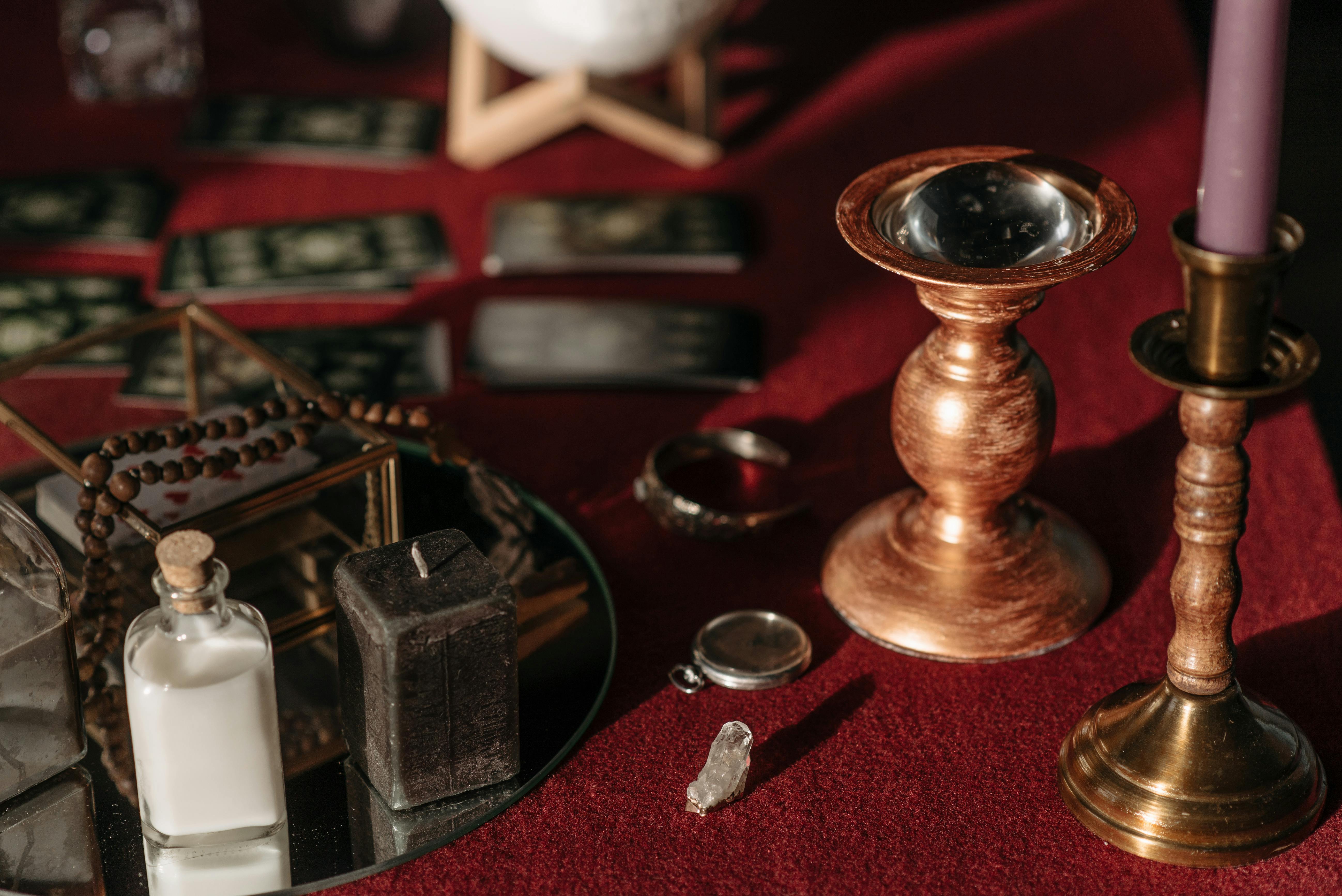 divination and spellcraft tools, on a table.